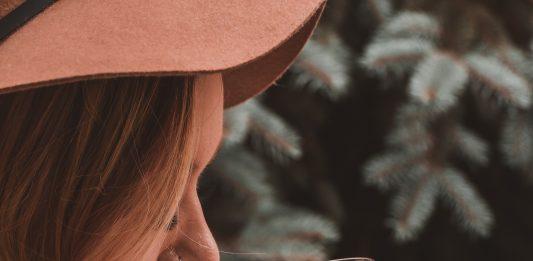 woman holding cocktail glass