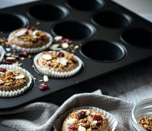 cupcakes on round tray beside clear glass bowls