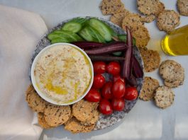 fried chicken and sliced tomato on white ceramic plate