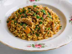 Rižota z govejimi trakci in gobami, kot iz dobre gostilne